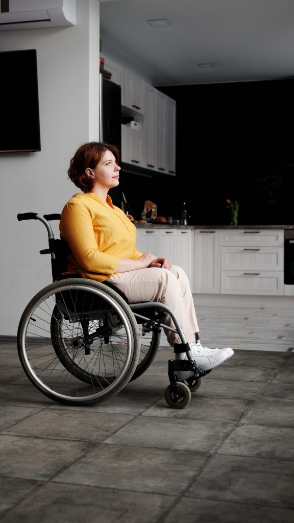 Photo of person with disability at home enjoying the view